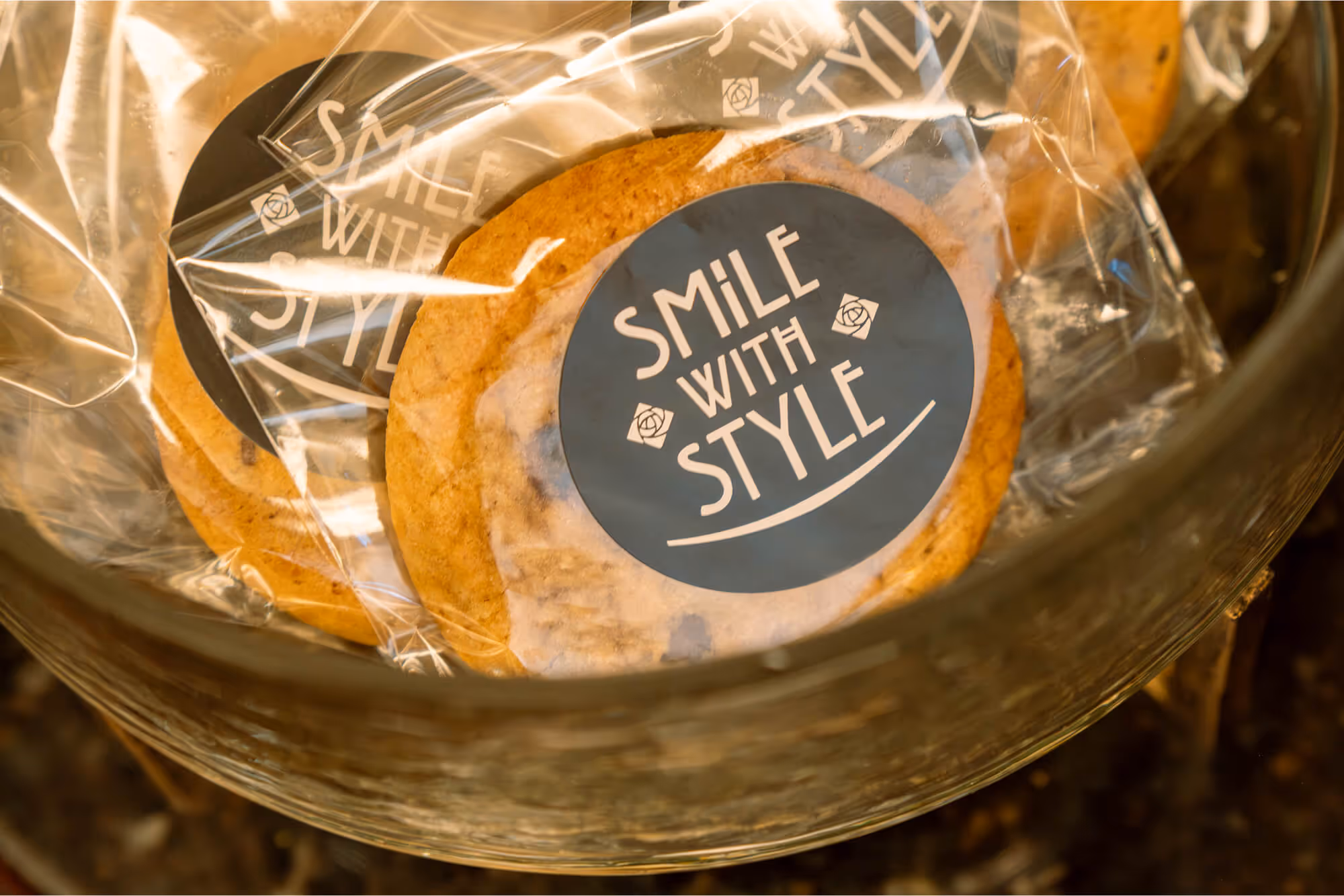 A couple of cookies sitting on top of a plastic bag.