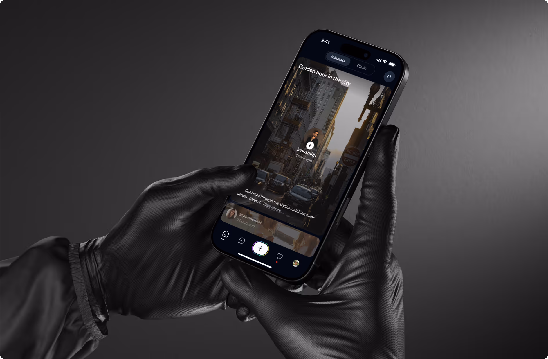 Hands wearing black gloves holding a smartphone displaying a city photo on a social media app.