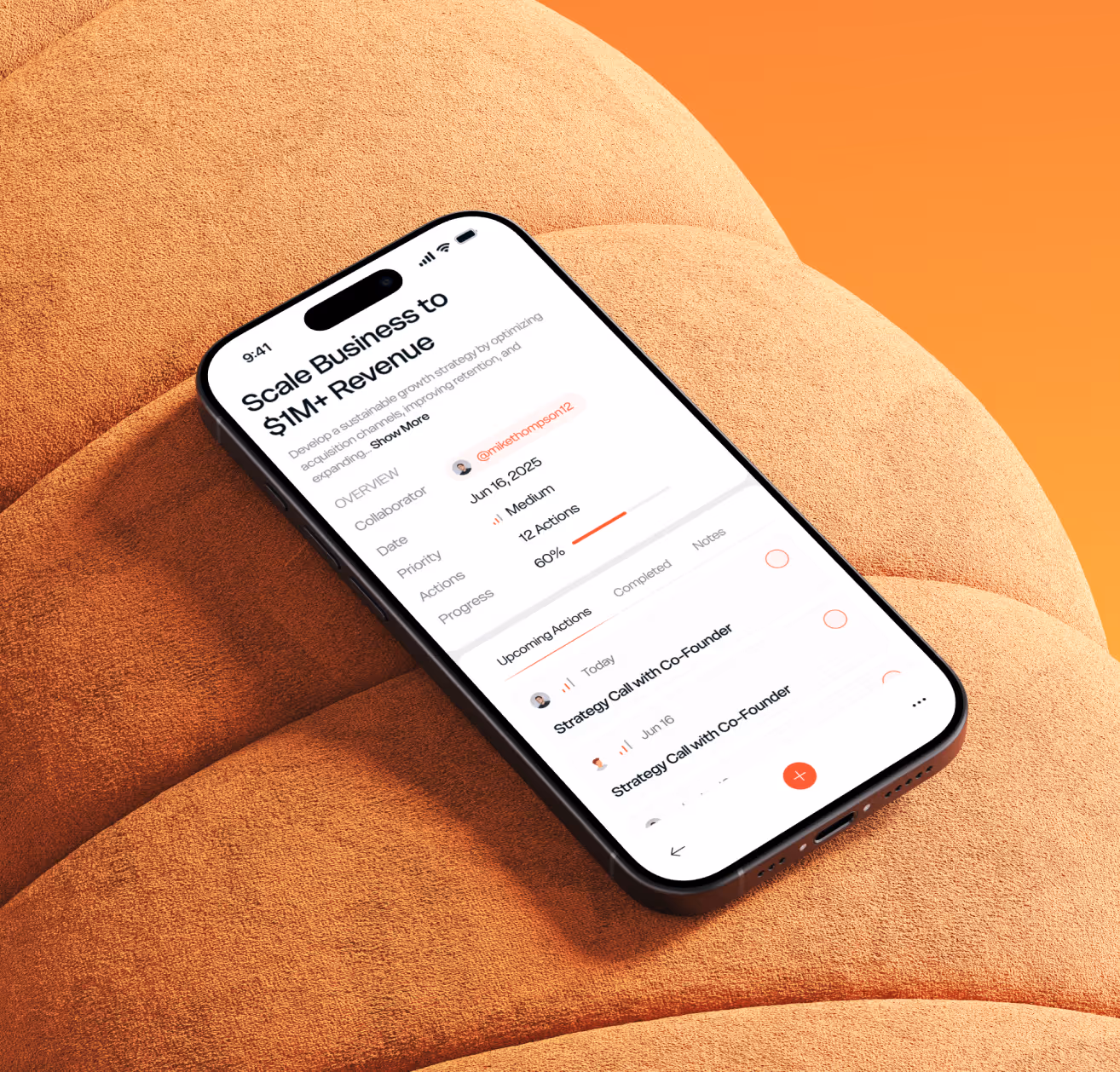 Smartphone displaying a business growth strategy app with tasks, progress, and priority details on screen.
