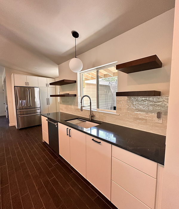 After—modern flat-panel kitchen cabinets with open shelves and quartz counters