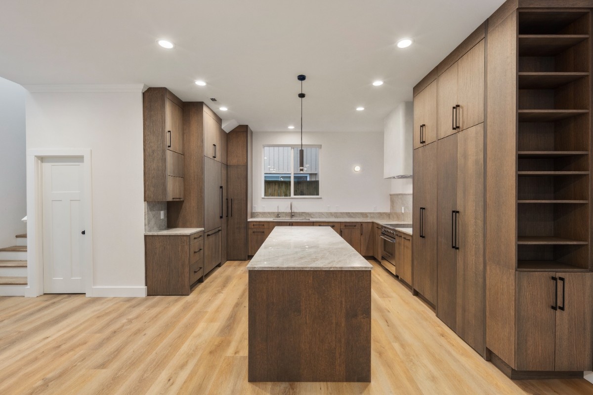 Durable plank flooring laid during kitchen floor installation