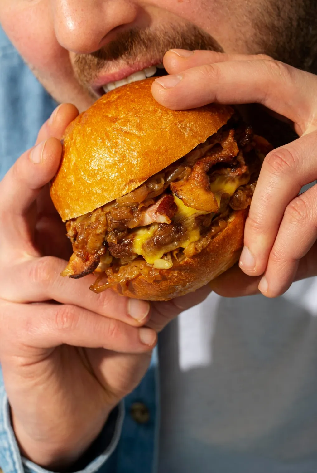 Man eating burger