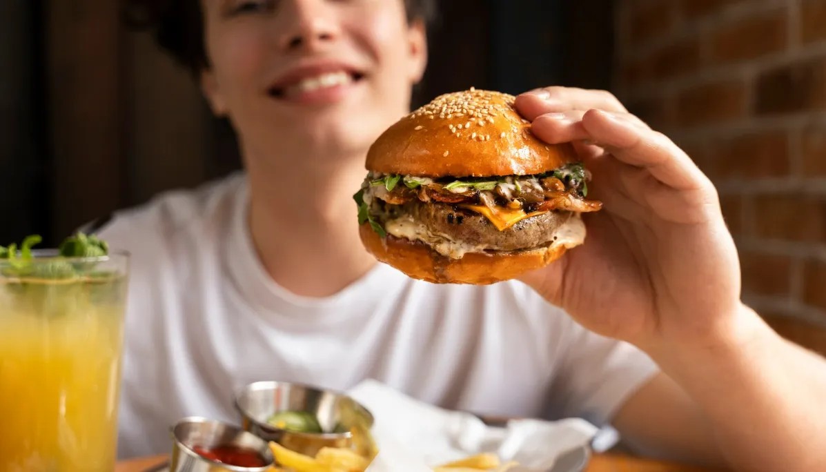 Woman eating burger