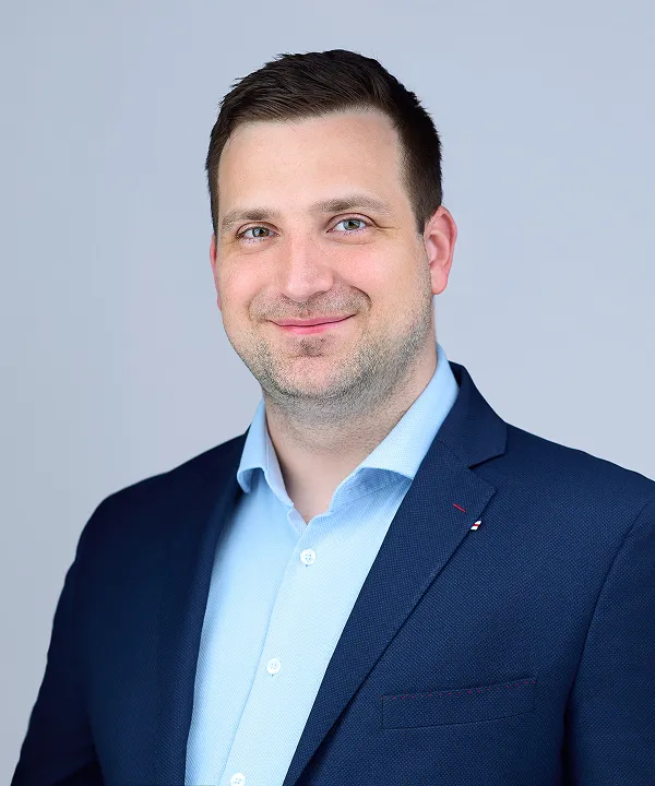 A portrait of Paweł Szewczuk, DCX R&D Director