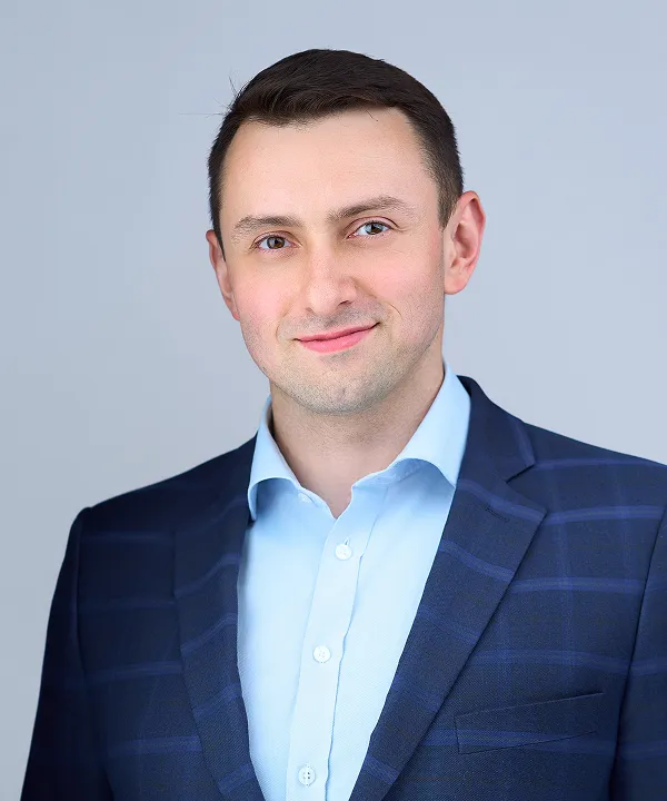 A portrait of Przemysław Załucki, DCX Business Development Manager