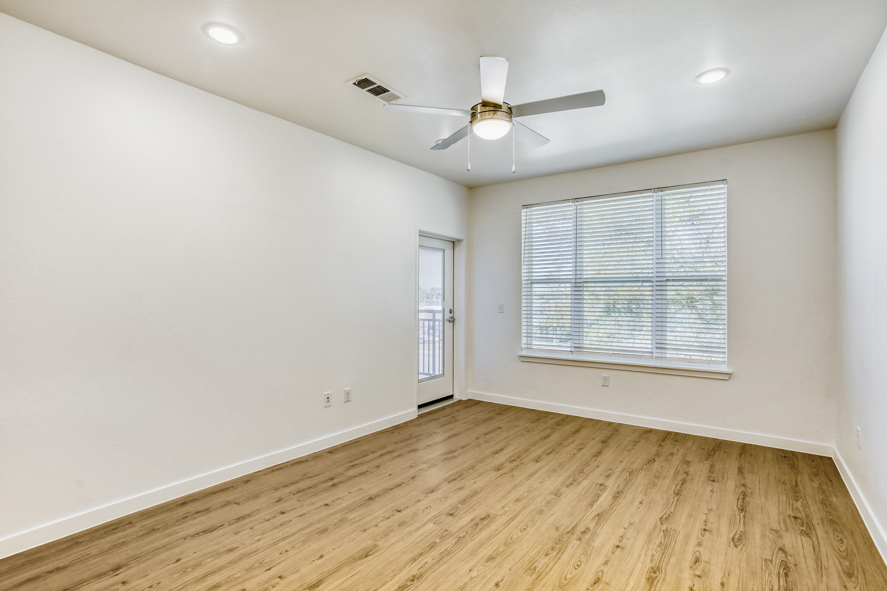 Living room with light brown flooring