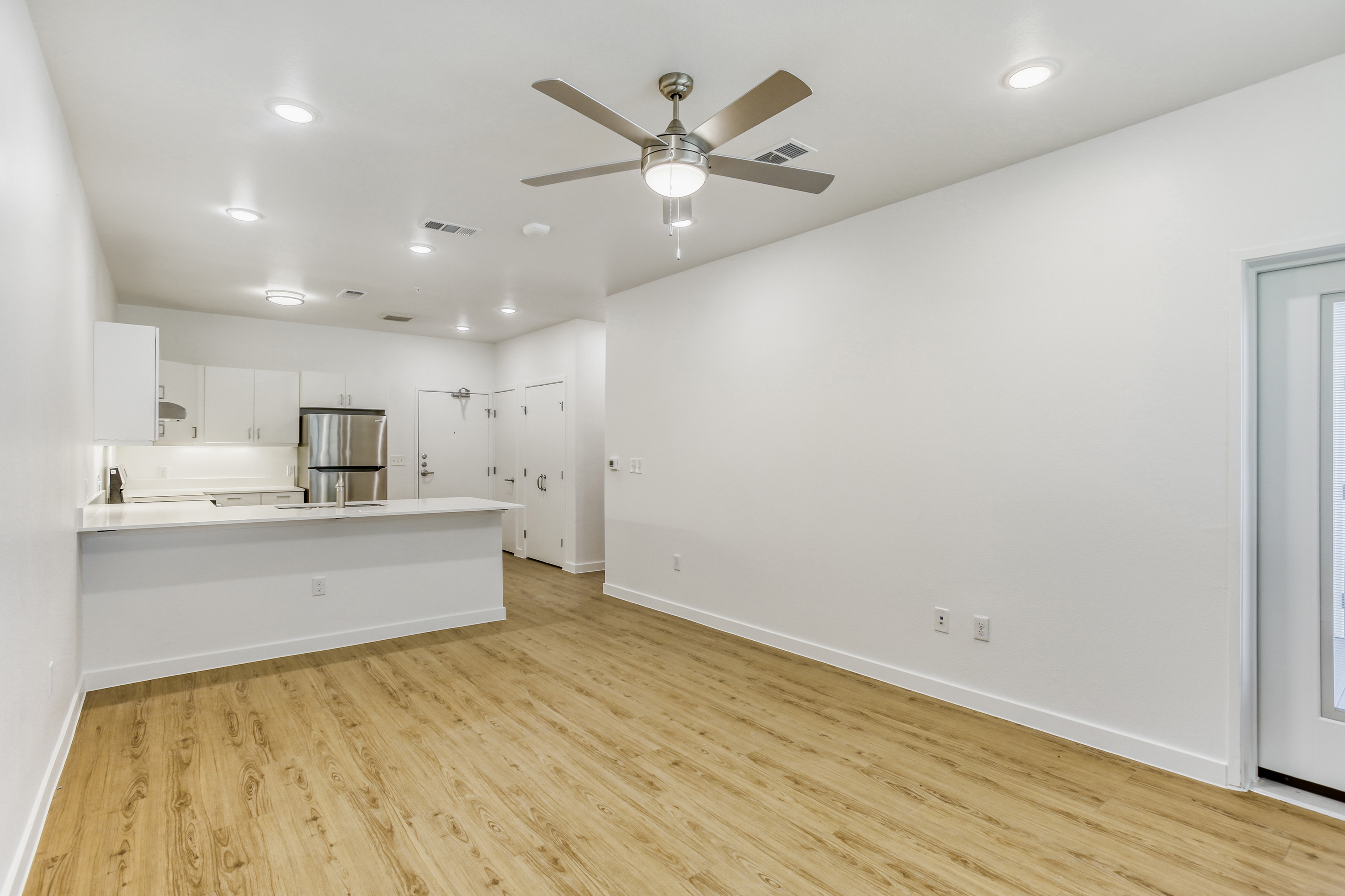 Living room with light brown flooring