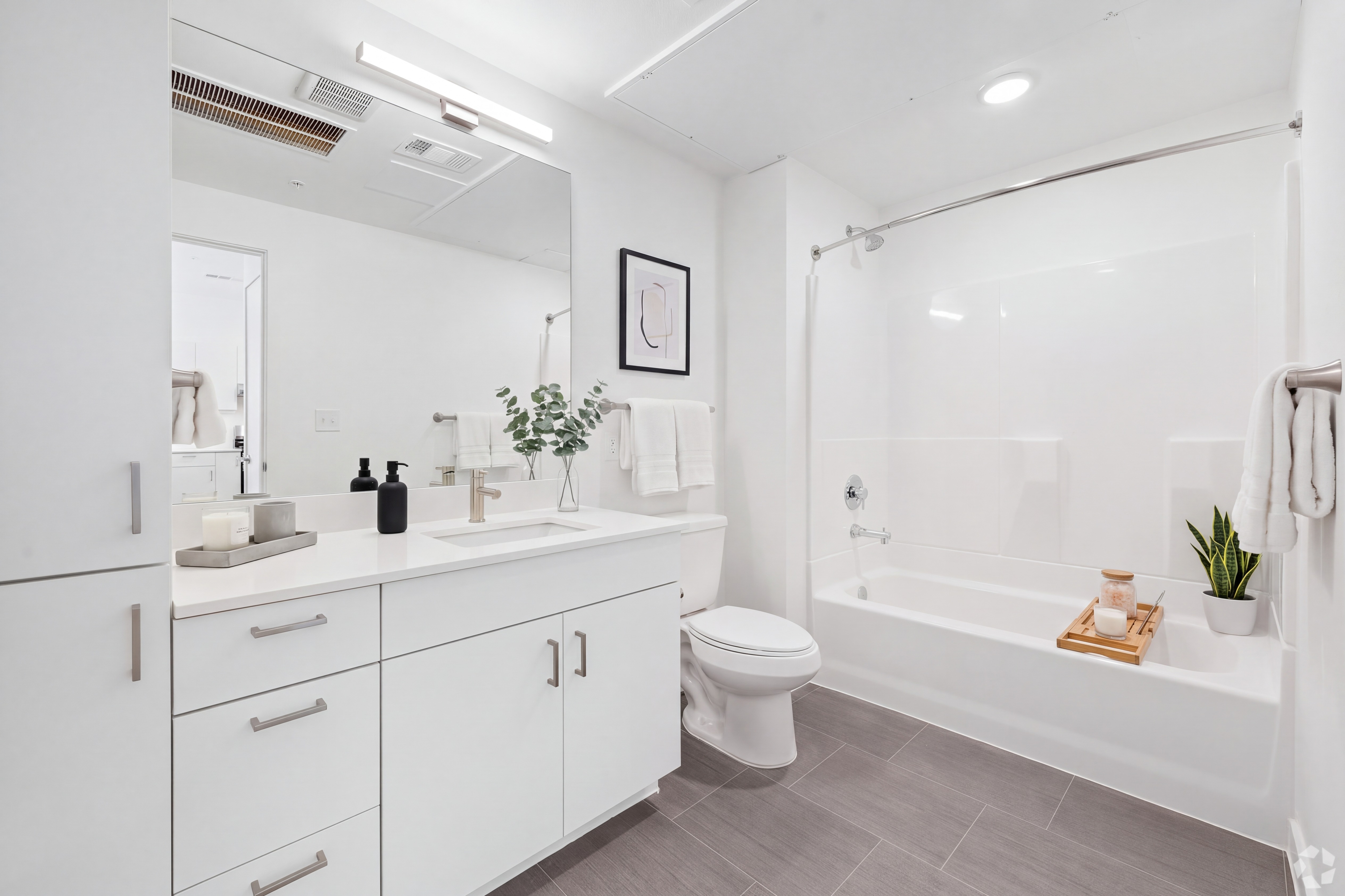 Bathroom with white cabinets