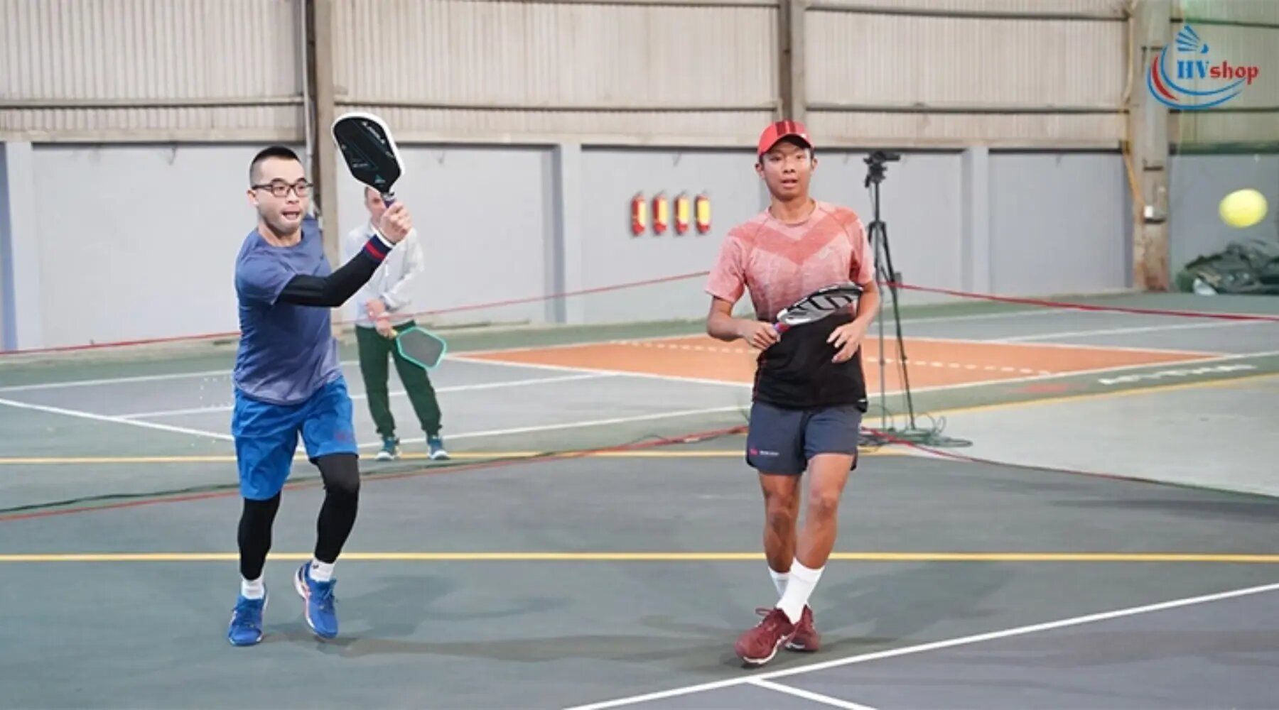 Quang Duong with fellow pickleball players in court
