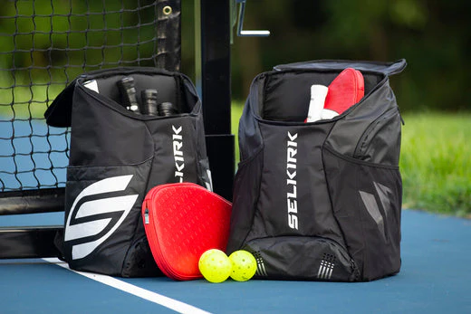 Black pickleball bag with paddle compartments