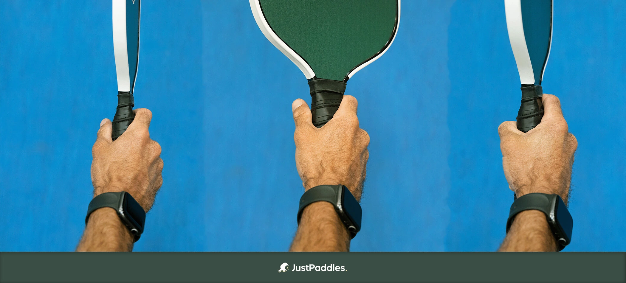 Proper pickleball paddle grip technique showing hand positioning and grip tape application