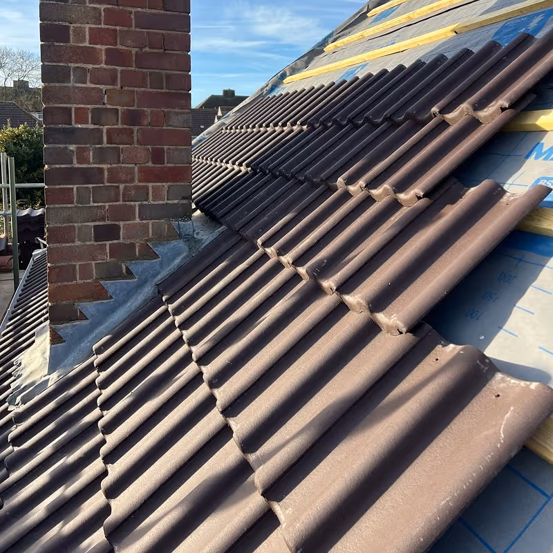 Tiled roof being installed