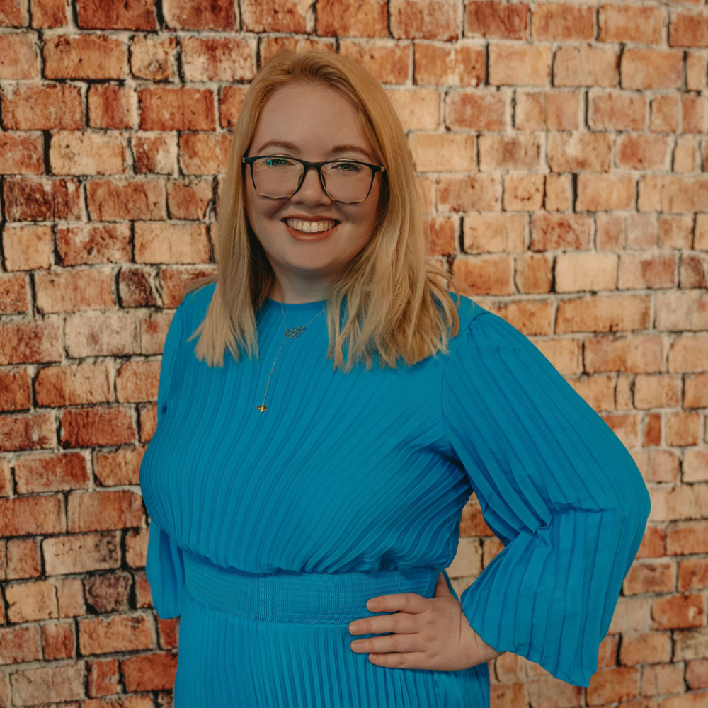 Professional headshot of Gianna, co-founder of Cyber Marketing Society