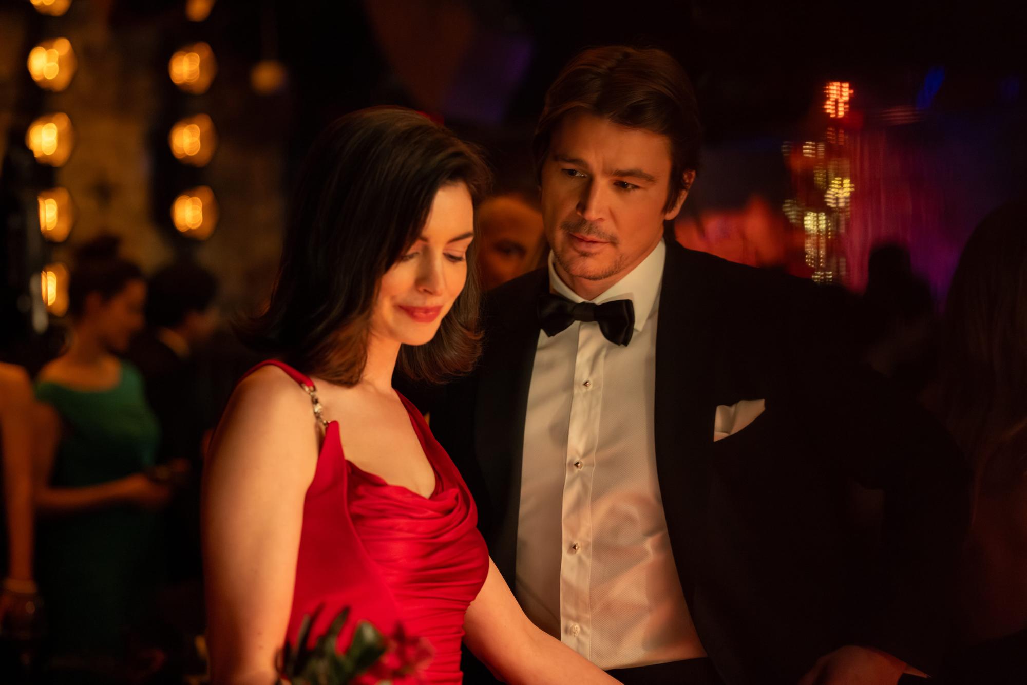 Verity promotional still showing Anne Hathaway and Josh Hartnett dressed for a formal event