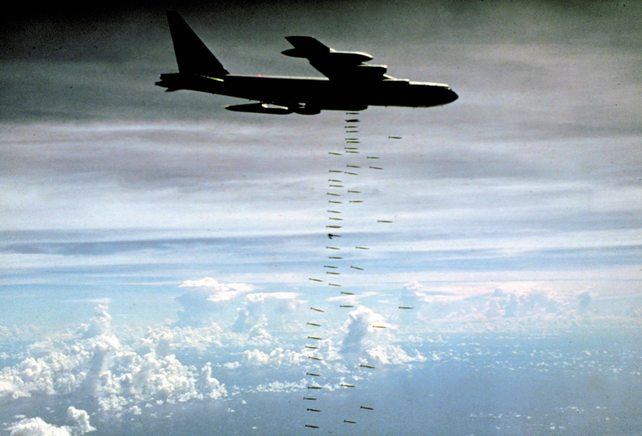 B-52 bomber releasing bombs during U.S. air operations in Southeast Asia, via Air & Space Forces Magazine