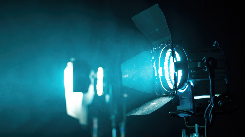 A film light projecting a blue beam