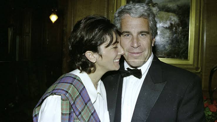 Two people dressed formally at an event