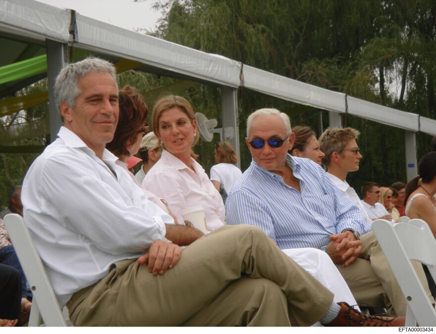 People seated together outdoors