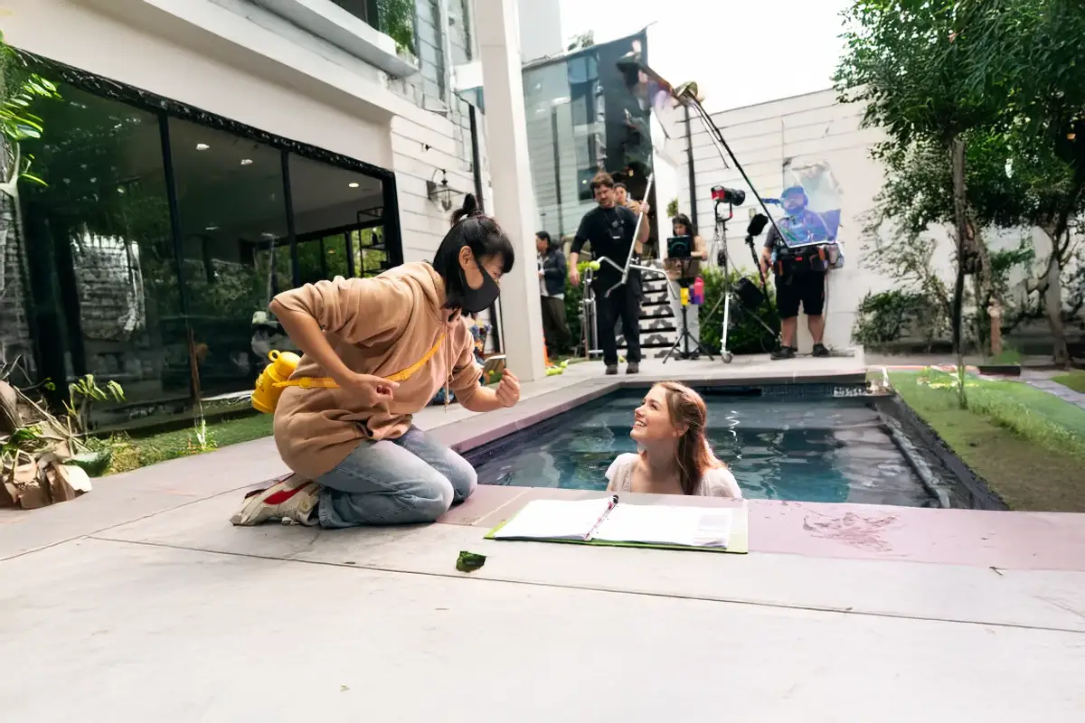 Film crew recording an outdoor scene