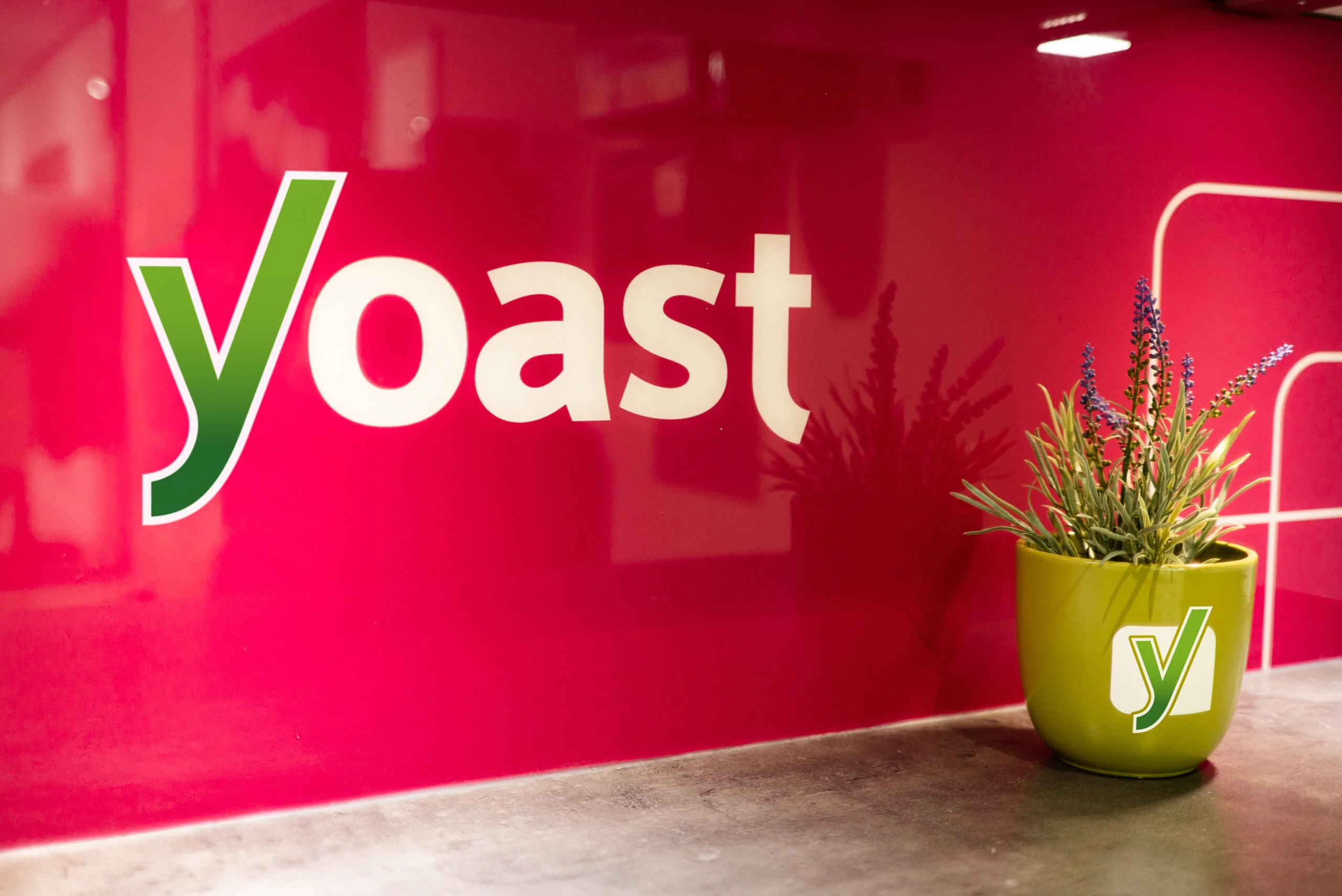 Yoast logo against a red background