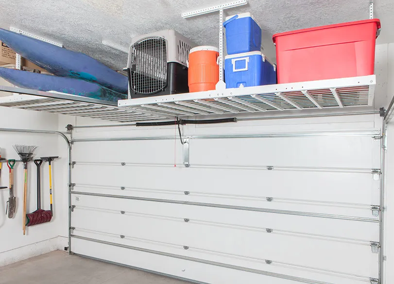 garage overhead shelving above  garage door. 