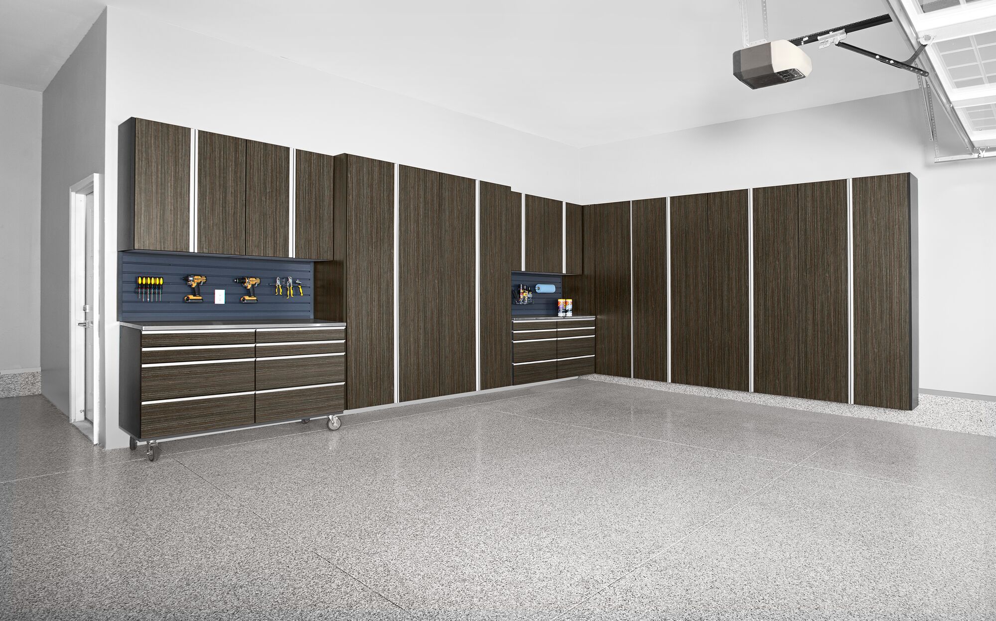 dark brown cabinets with a workbench. 