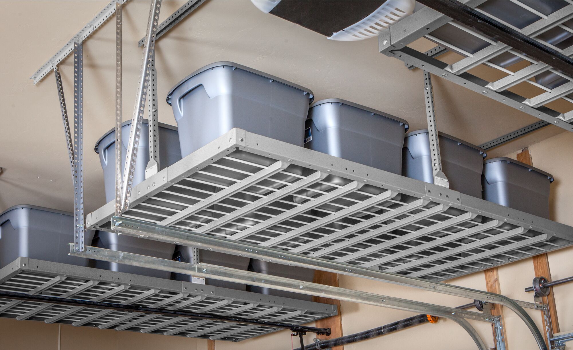 Garage overhead storage with grey storage totes
