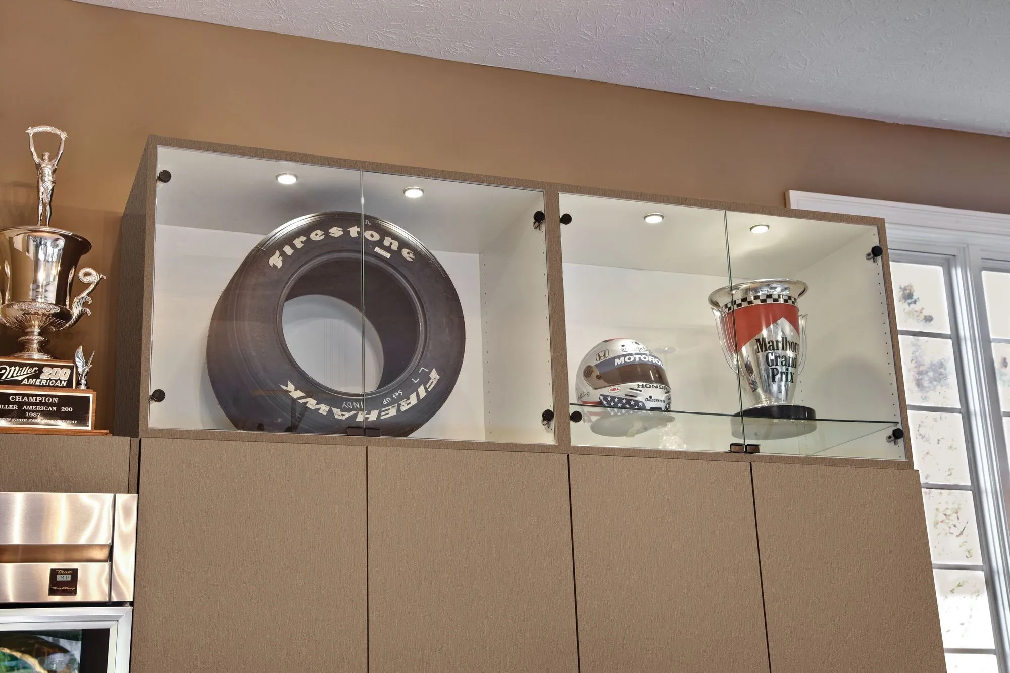 cabinet with trophy case.  