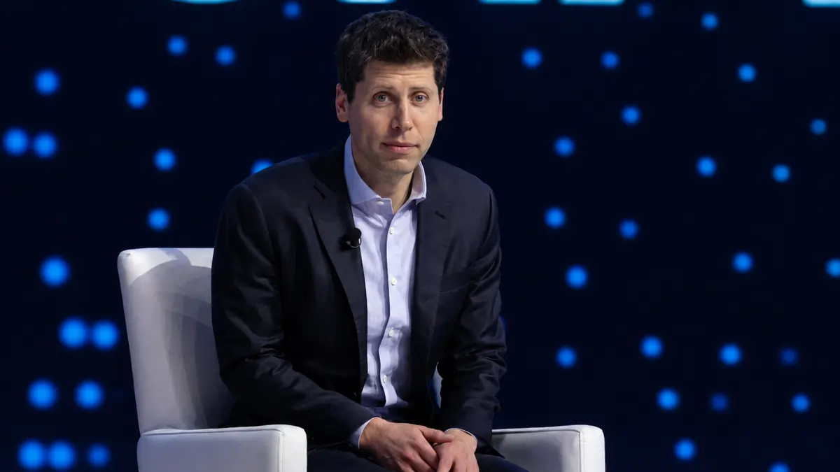 OpenAI CEO speaking on stage