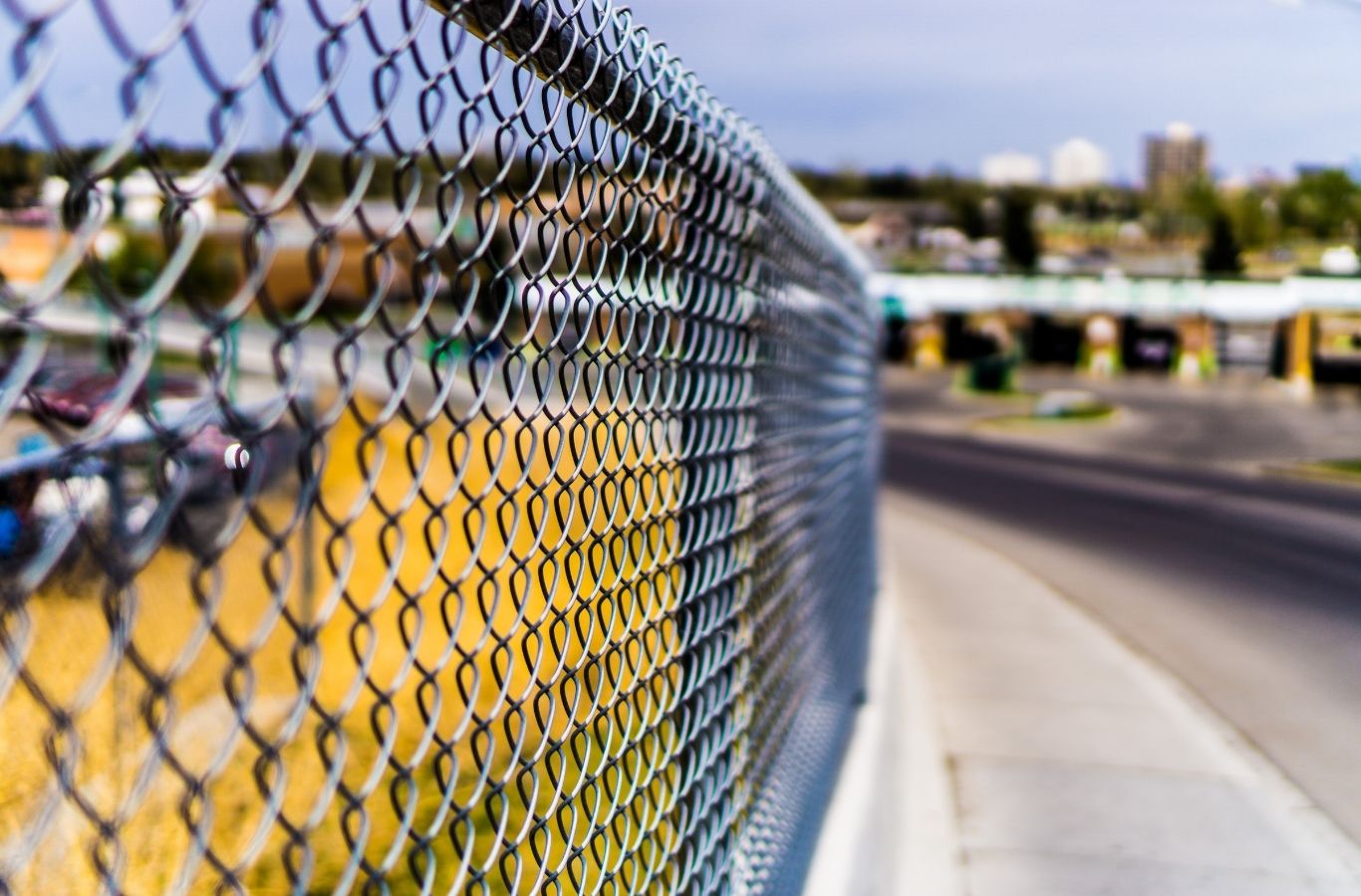 Fence Company of Columbus crew completing chain link fence installation in Hilliard, OH, focusing on security, durability, and clean setup.