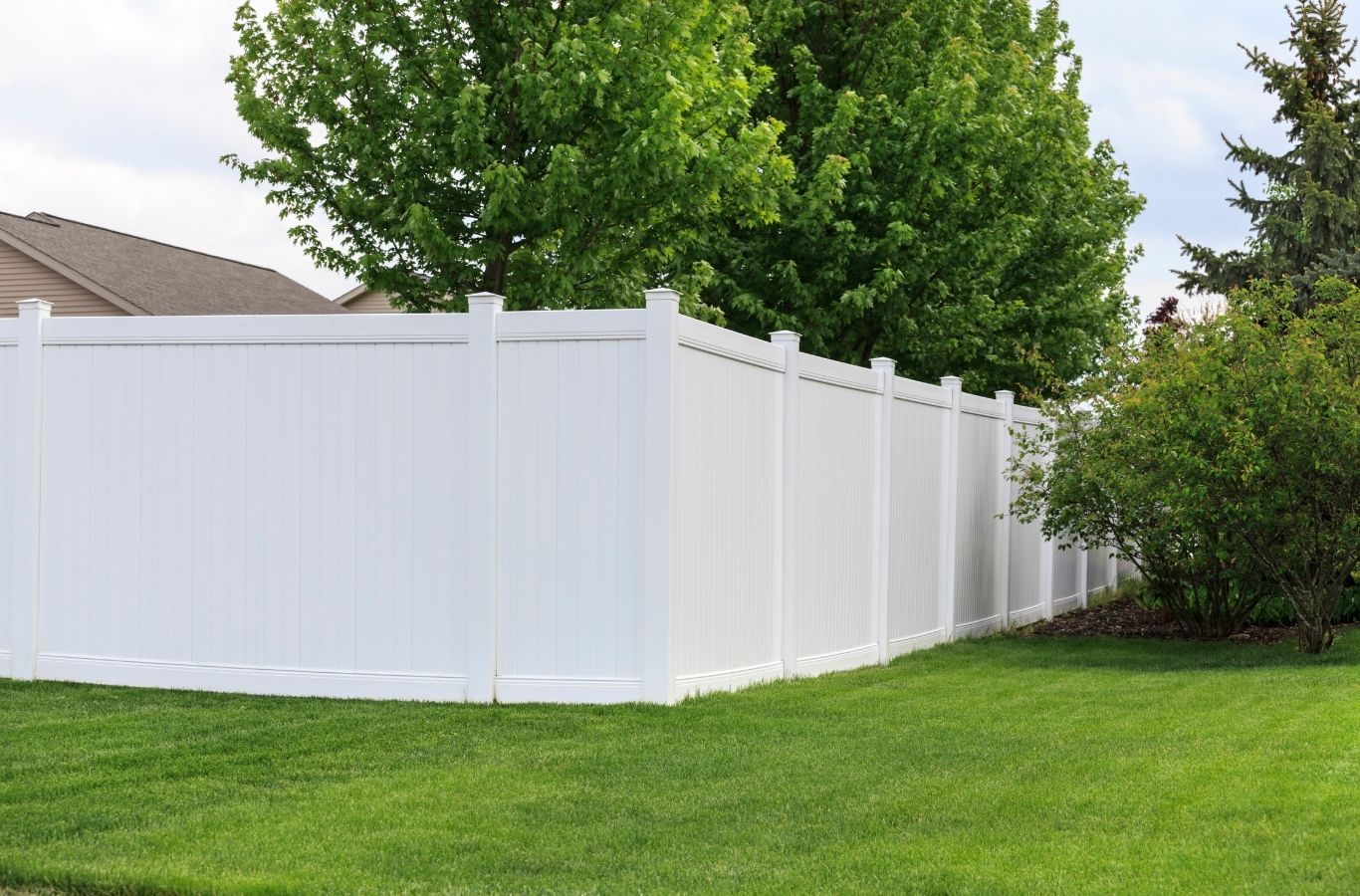Fence Company of Columbus crew installing a vinyl fence in Worthington, OH, highlighting privacy, durability, and clean low maintenance design.