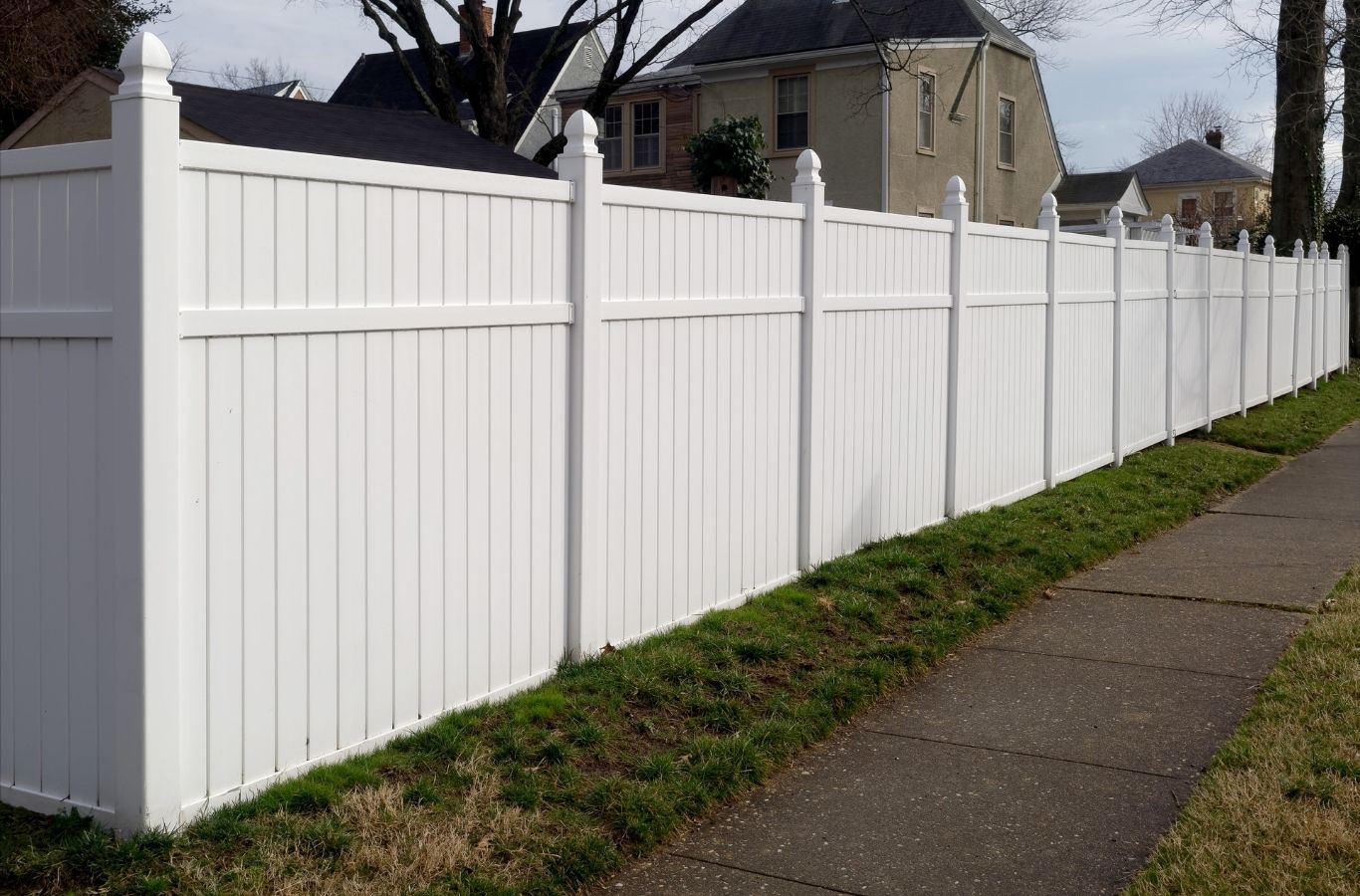 Fence Company of Columbus crew installing a vinyl fence in Hilliard, OH, showcasing privacy, durability, and clean low maintenance design.