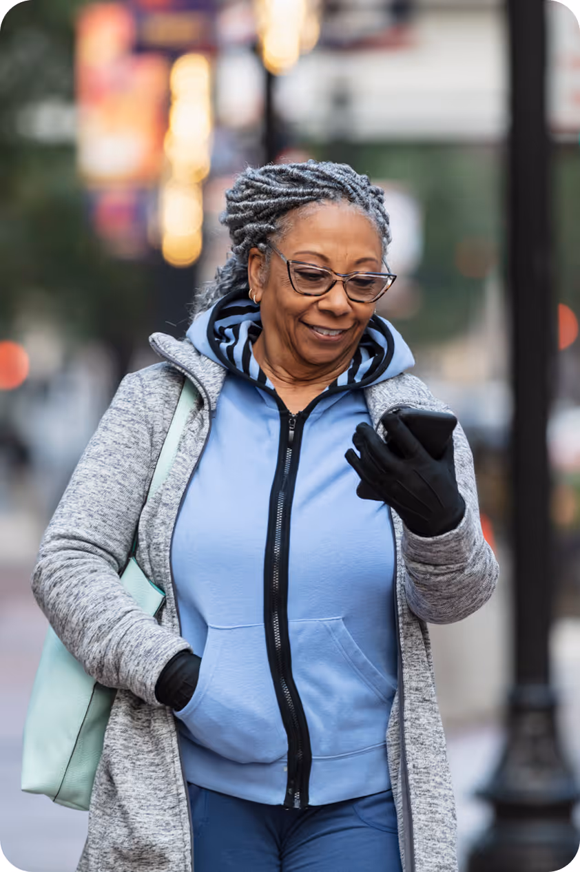 a woman looking at a phone