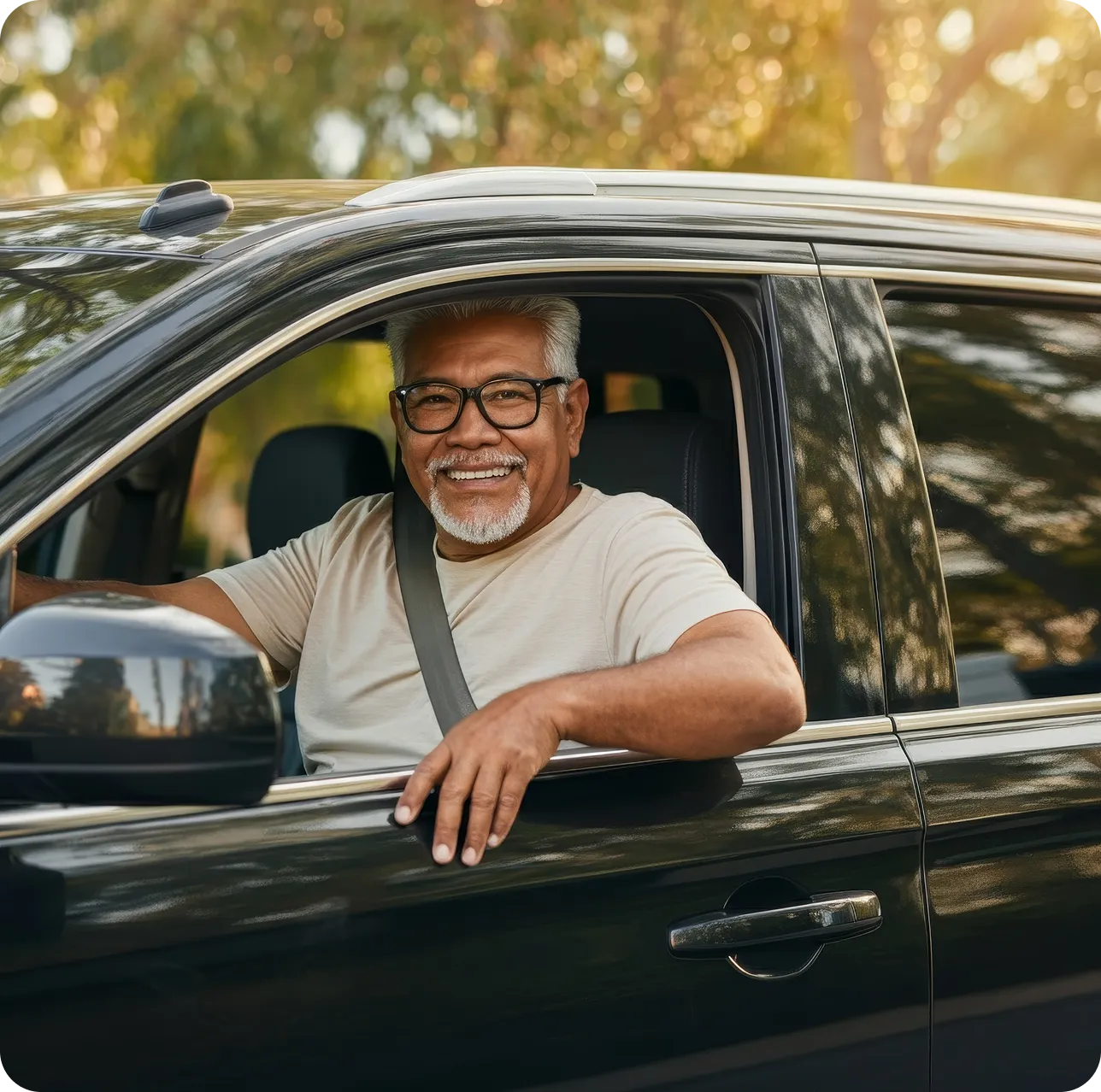 a man in a car smiling