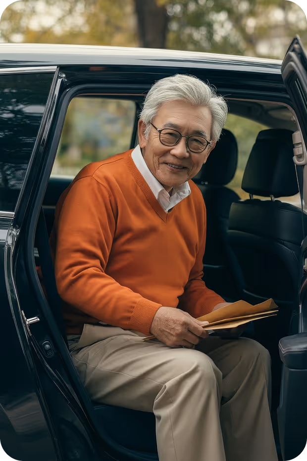 a man sitting in a car with papers