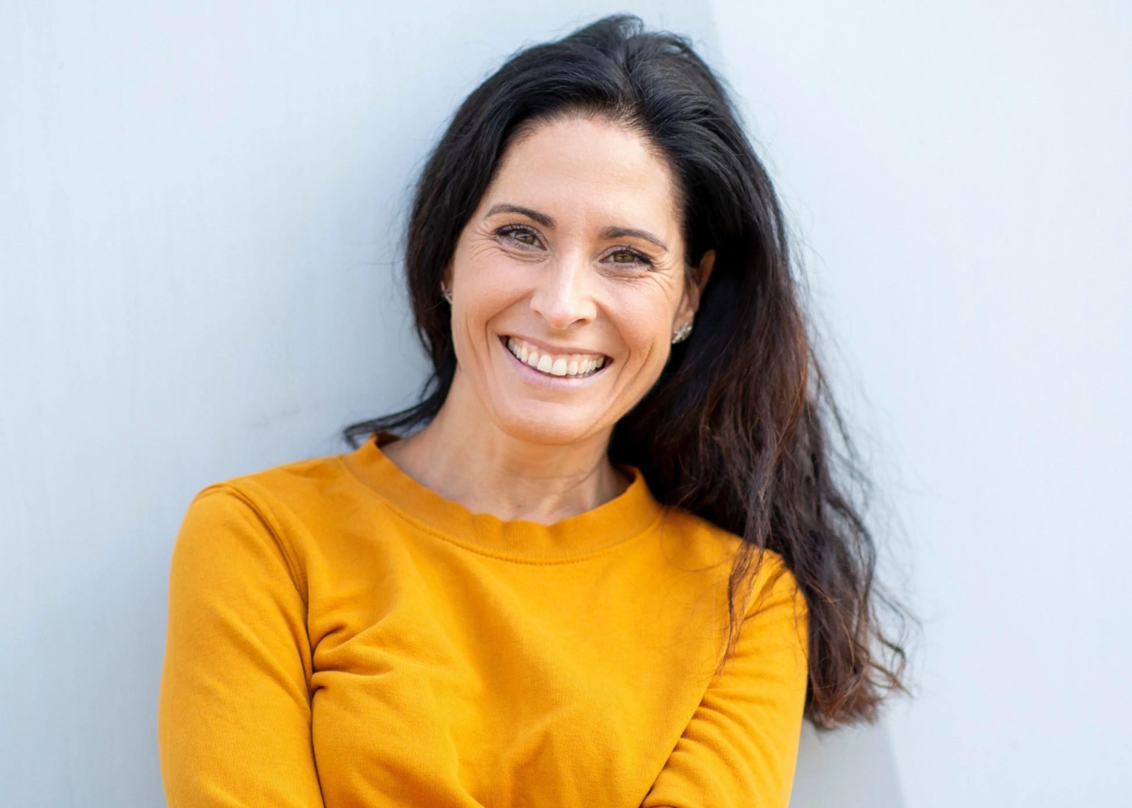 A woman smiling