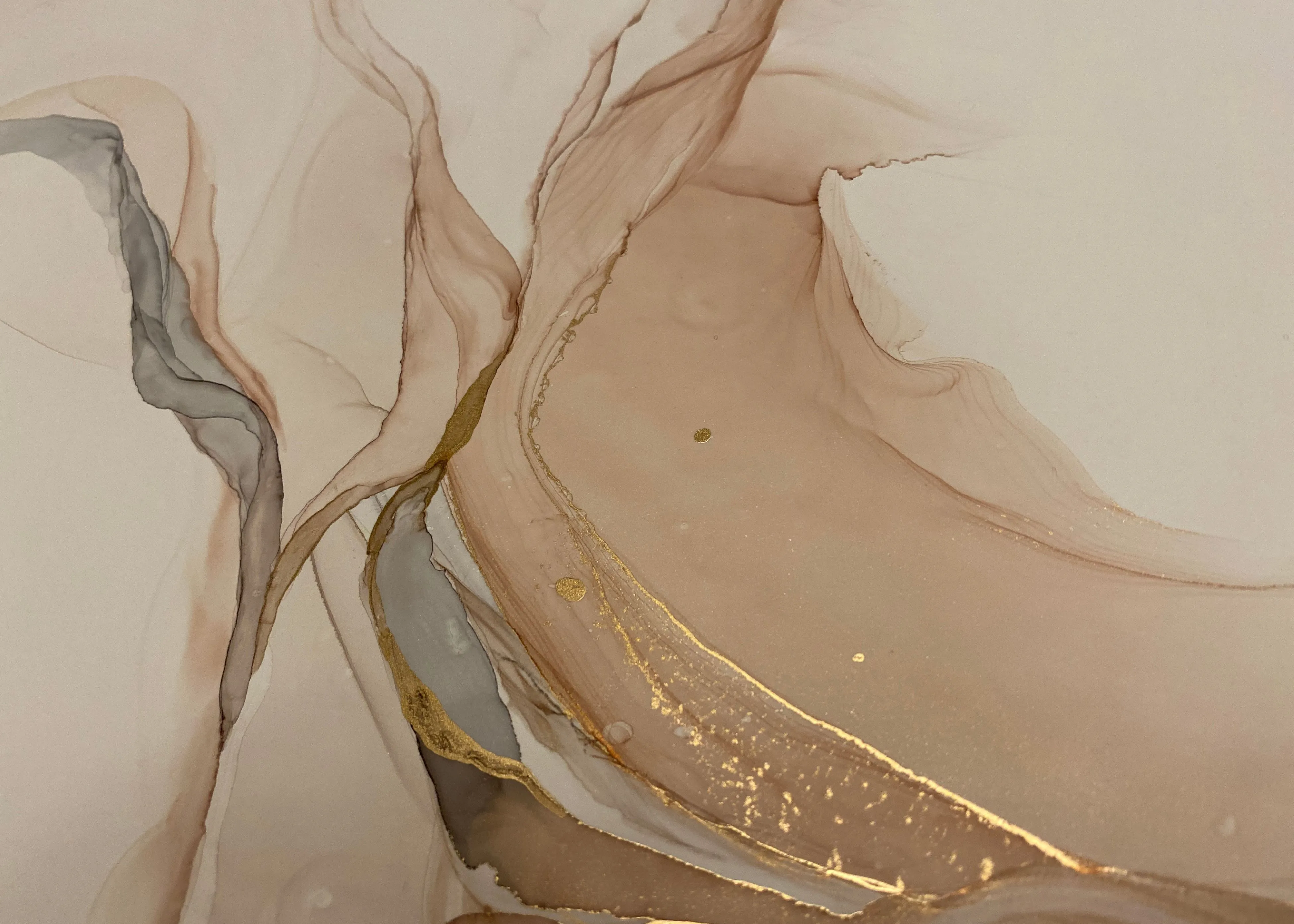 A white and gold marble background