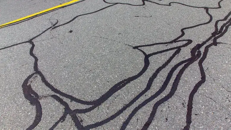 The Essential Guide to Asphalt Crack Filling in Massachusetts: Protecting Your Pavement Investment