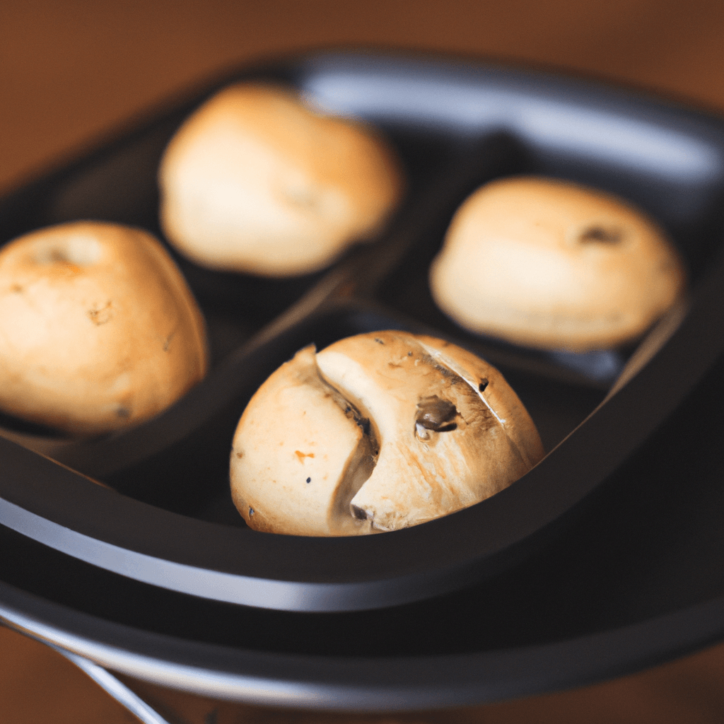 A tray of freshly cooked cookie dough balls air fried to perfection.