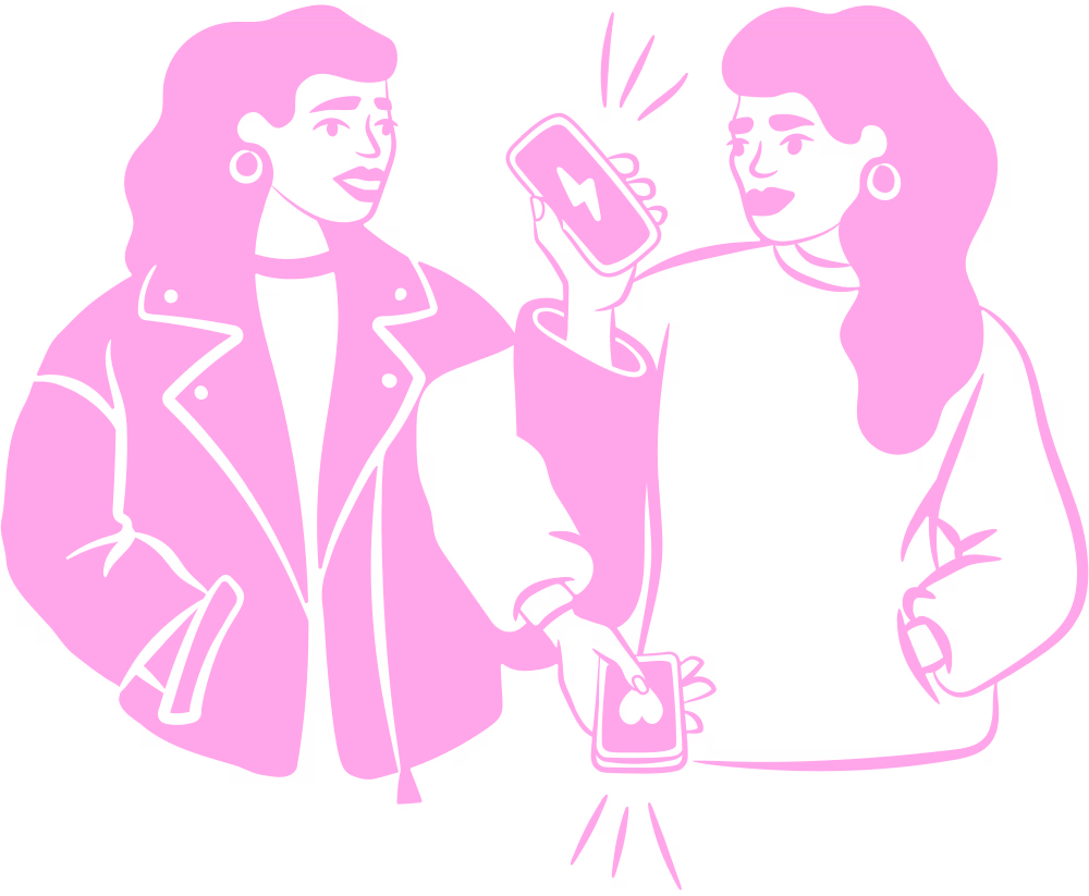 Two women sharing content on a phone