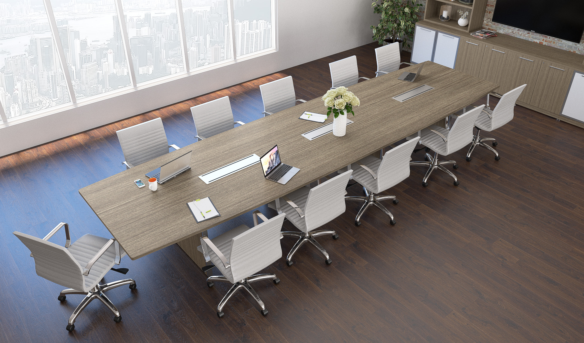 Corp Design boat shape conference table seating twelve with a city skyline view