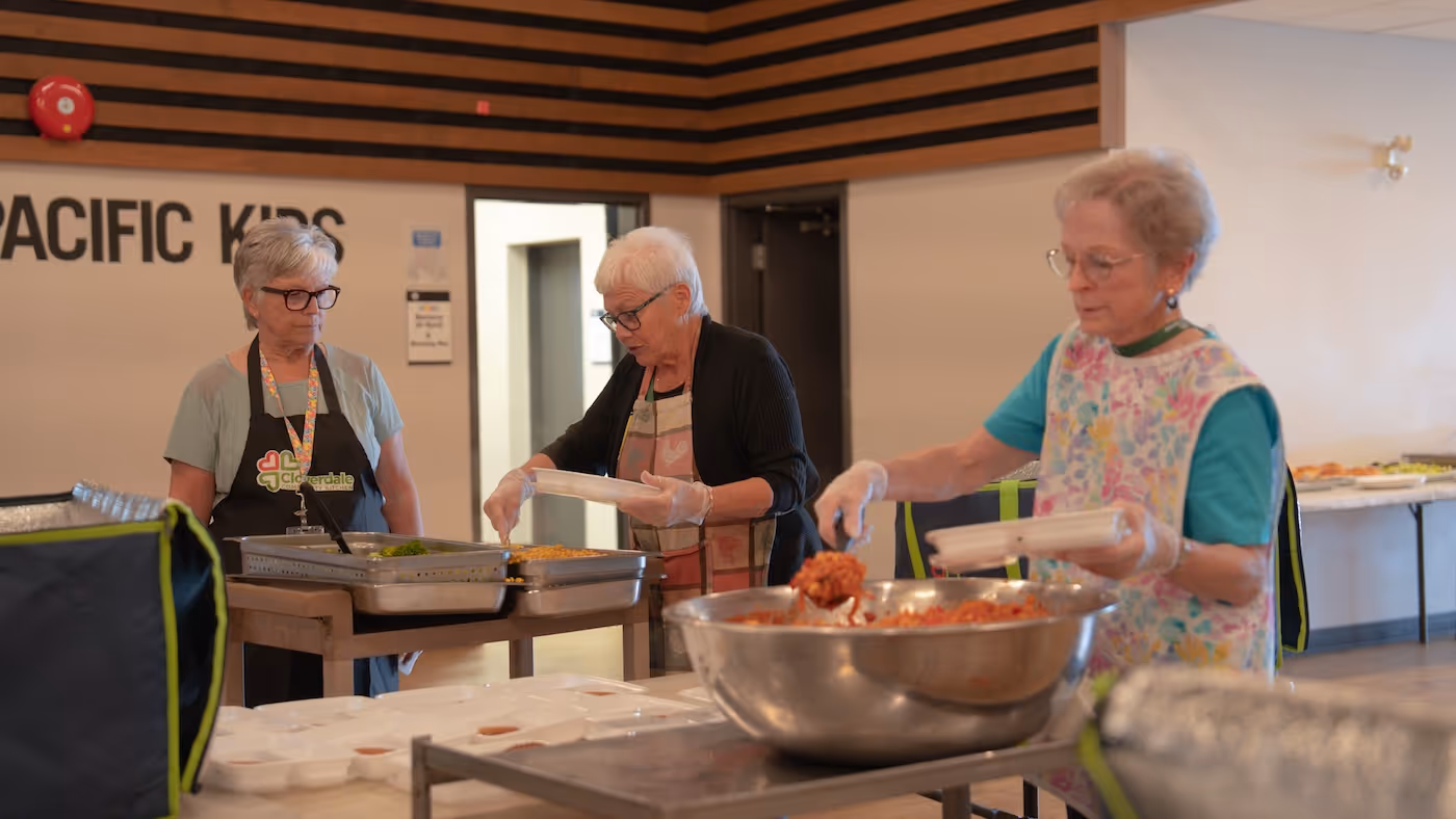 Storehouse Community Hub volunteers preparing meals
