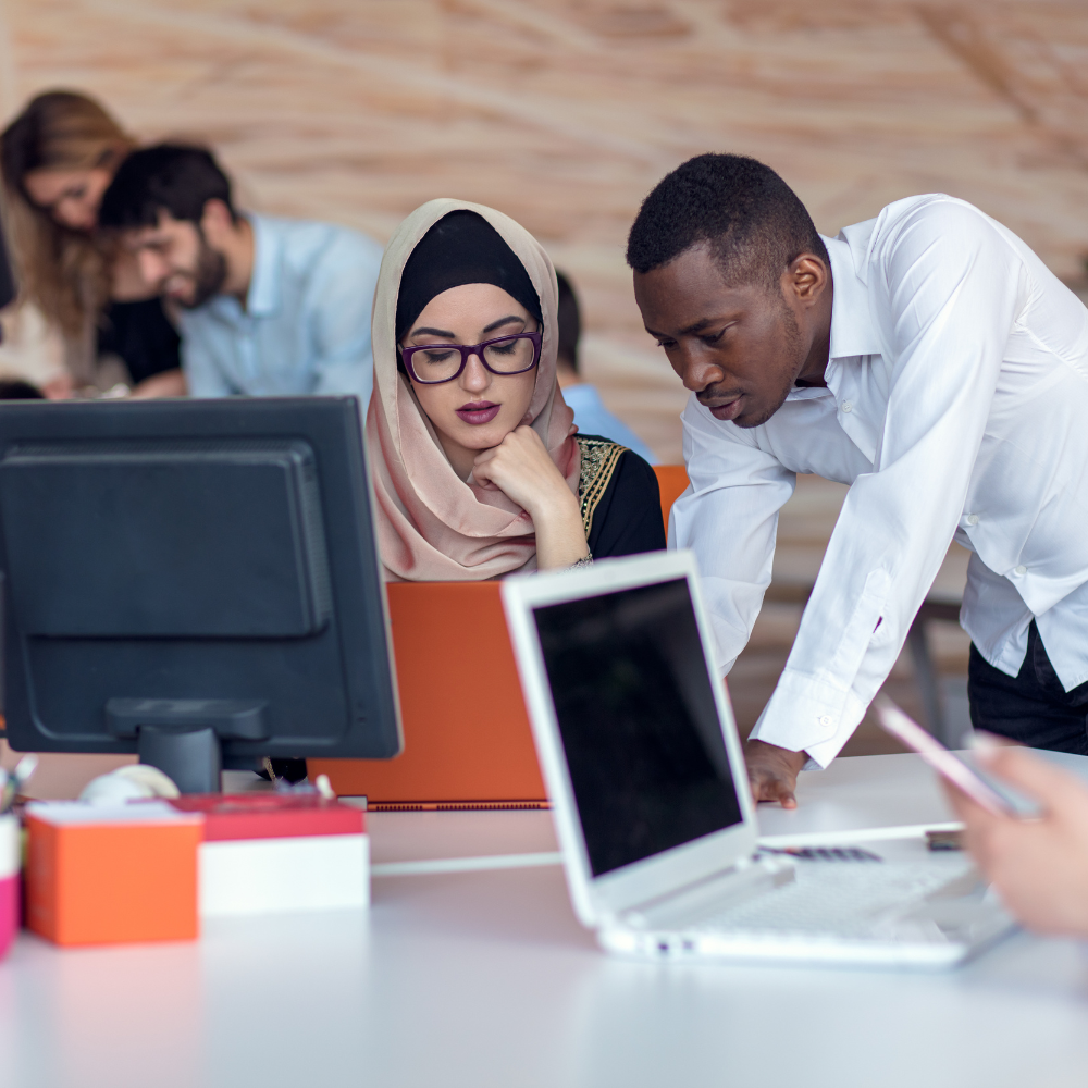 people working on a work project together