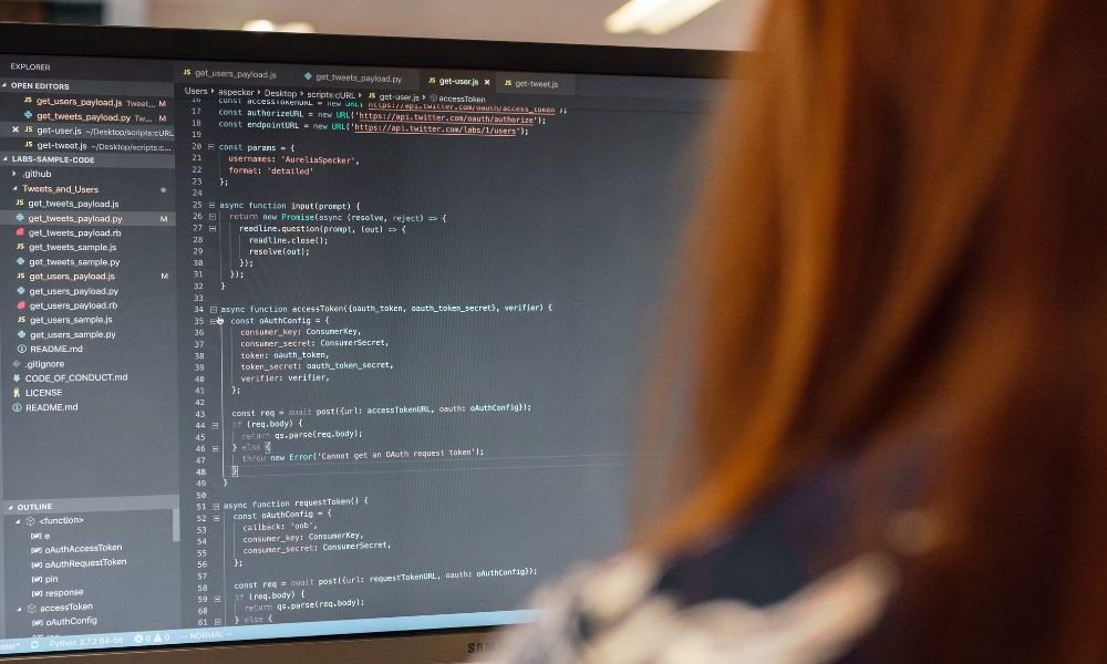 Backend developer writing code on a computer screen