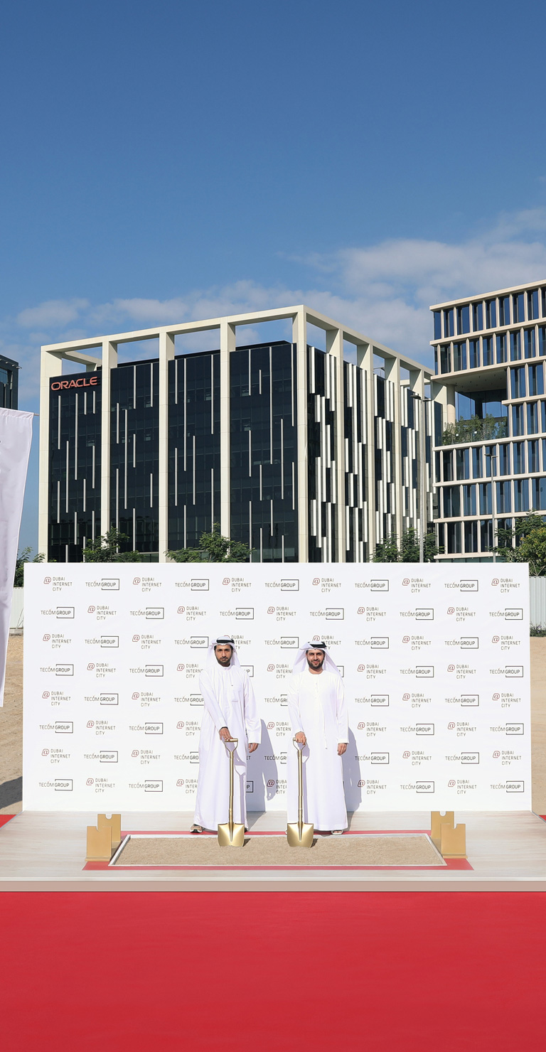 Evening view of Dubai Outsource City from afar TECOM Group breaks ground on specialised tech offices at Dubai Internet City amid high demand for commercial real estate in Dubai