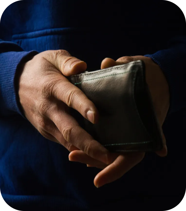 Hands holding a wallet