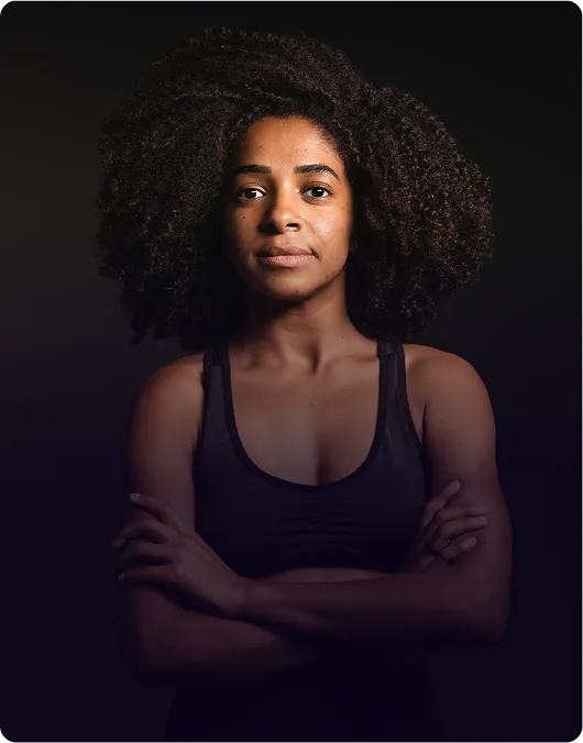 image of a female gym instructor with folded arms