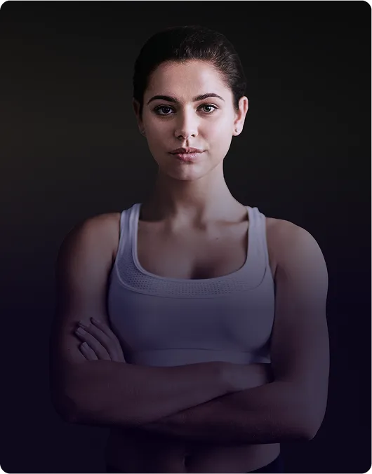 image of a female personal trainer with folded arms