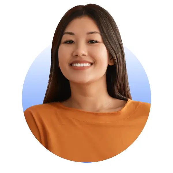 A smiling 30 year old Asian volunteer