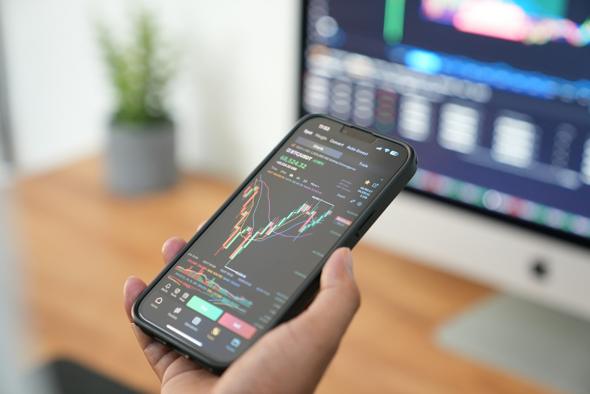 Person Holding Phone - Where to Learn Trading